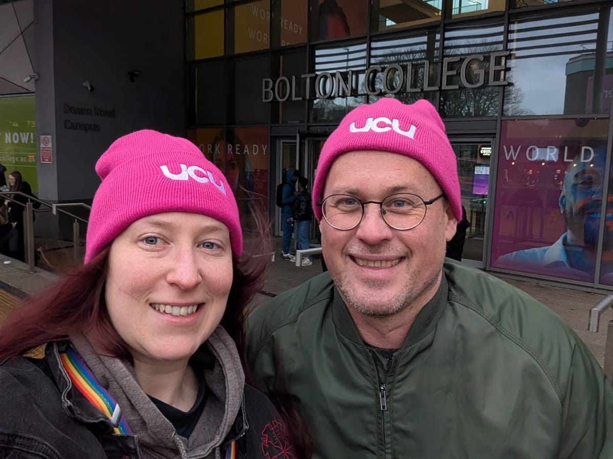 Suzi Toole and Mark Pendleton. Both are wearing pink UCU beanie hats. 